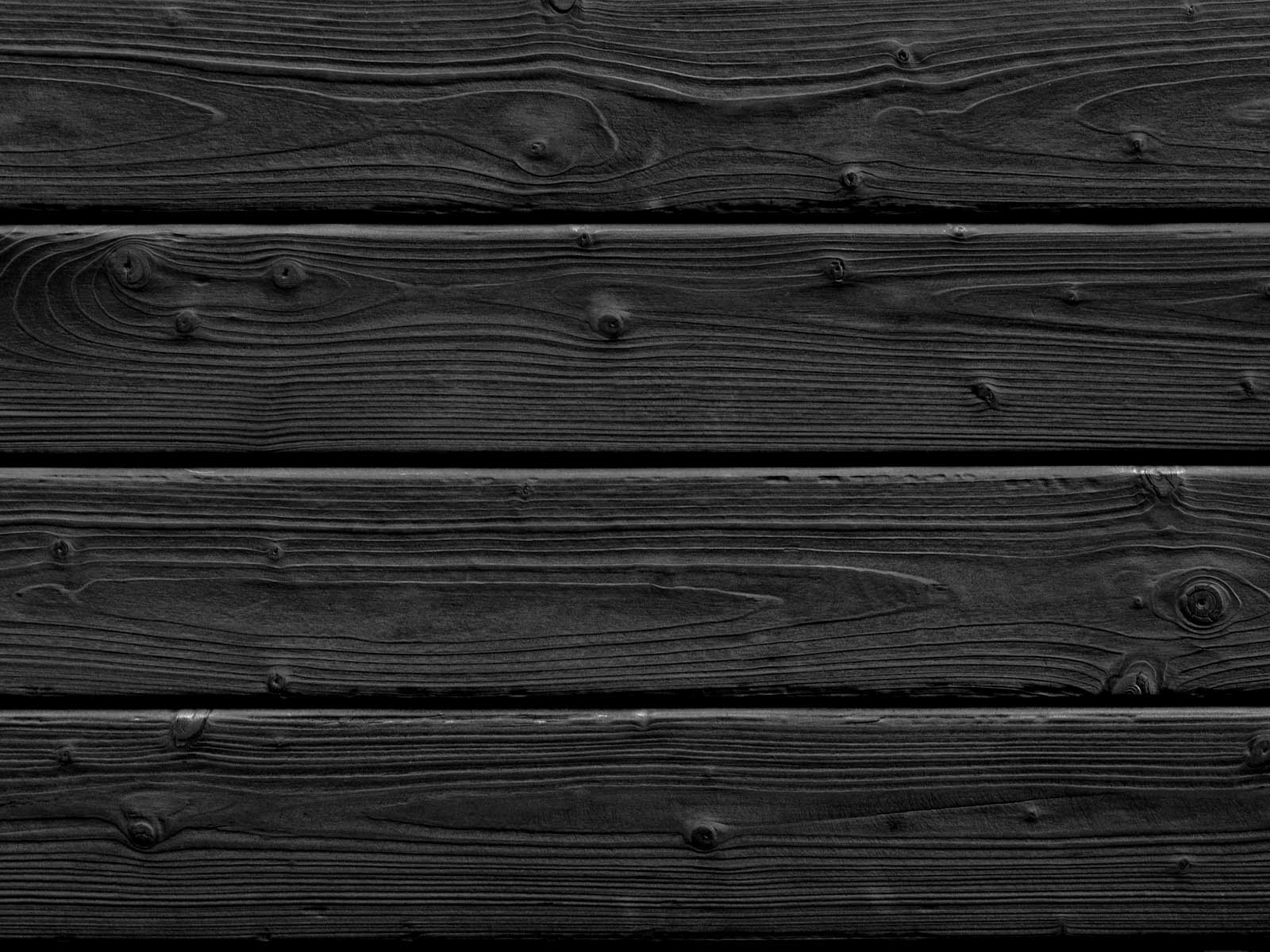 Natural Black finish without any carbonized layer.